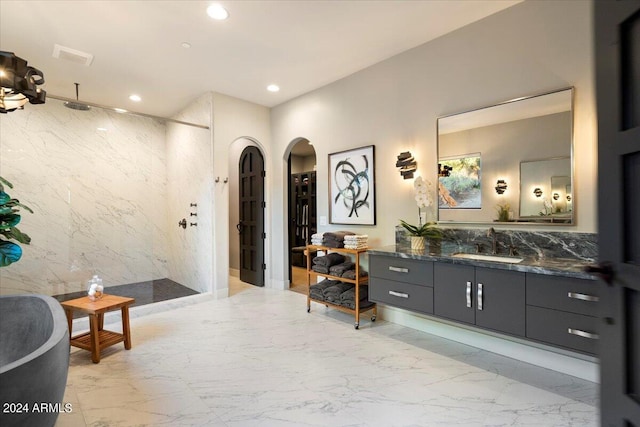 bathroom with tile walls, vanity, and plus walk in shower