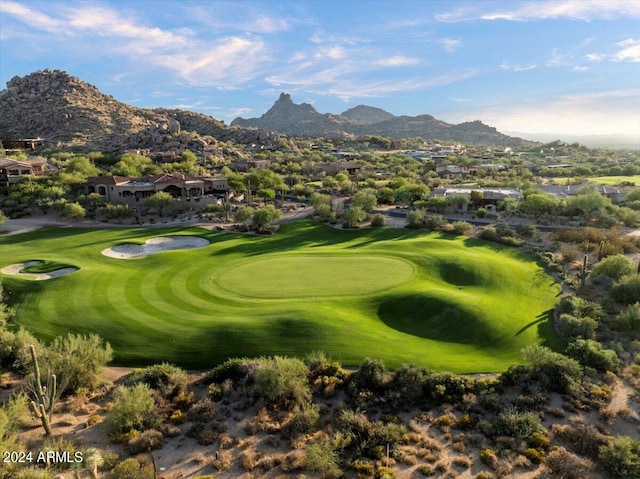 surrounding community featuring a mountain view