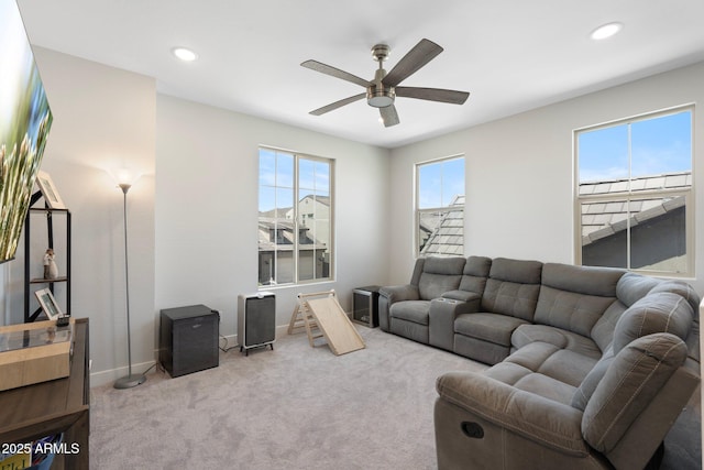 21134 W Minnezona Ave, Buckeye, AZ 85396 - carpeted living room featuring ceiling fan, baseboards, and recessed lighting