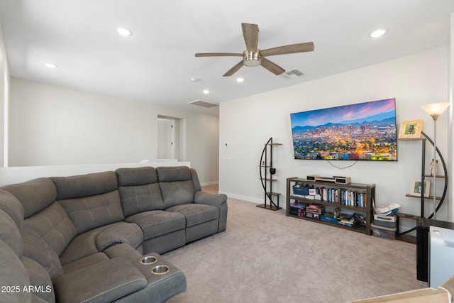 21134 W Minnezona Ave, Buckeye, AZ 85396 - carpeted living area with a ceiling fan, recessed lighting, and baseboards