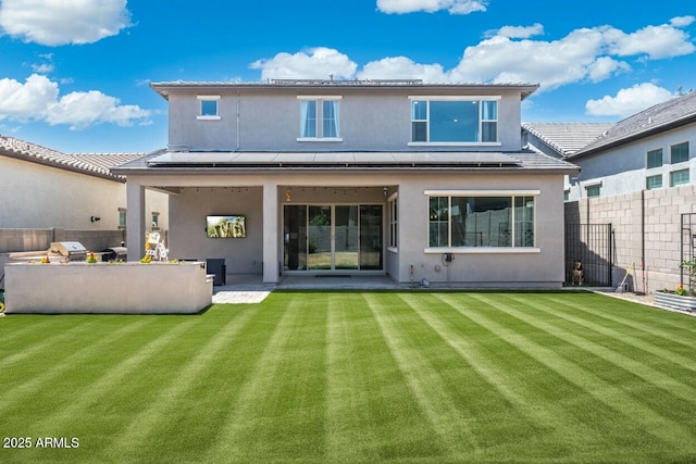 21134 W Minnezona Ave, Buckeye, AZ 85396 - rear view of property with stucco siding and a patio