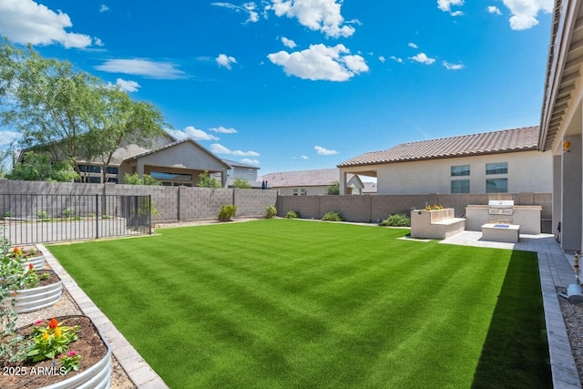 21134 W Minnezona Ave, Buckeye, AZ 85396 - view of yard with an outdoor kitchen
