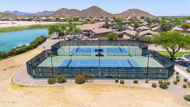 aerial view featuring a residential view and a water and mountain view