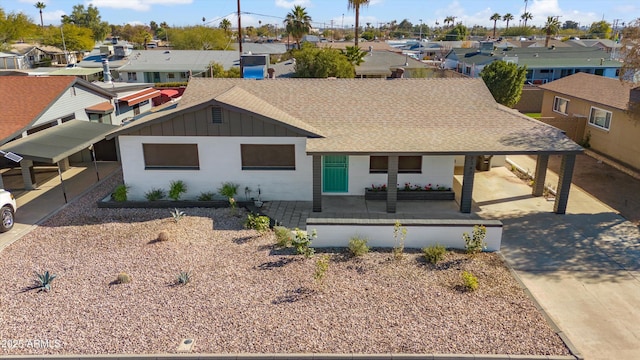 view of front of house with a patio area