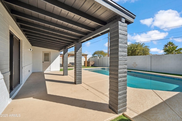 view of pool featuring a gazebo and a patio area