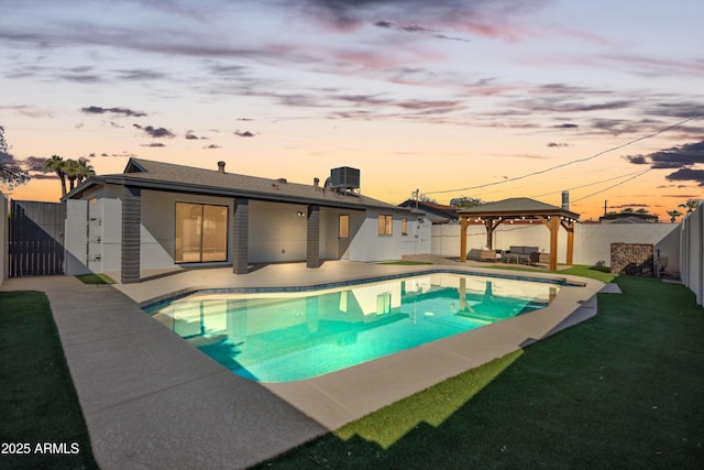 pool at dusk featuring a lawn, a gazebo, central AC, and a patio