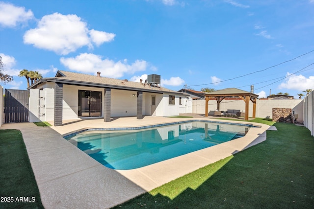 view of pool with central AC unit, a gazebo, a lawn, and a patio area