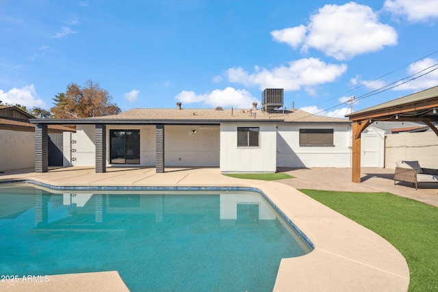 view of swimming pool featuring cooling unit, a gazebo, and a patio