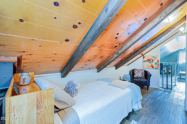 bedroom featuring dark wood-type flooring, vaulted ceiling with beams, and wooden ceiling