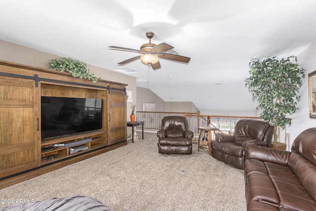 living room with ceiling fan, carpet, and lofted ceiling