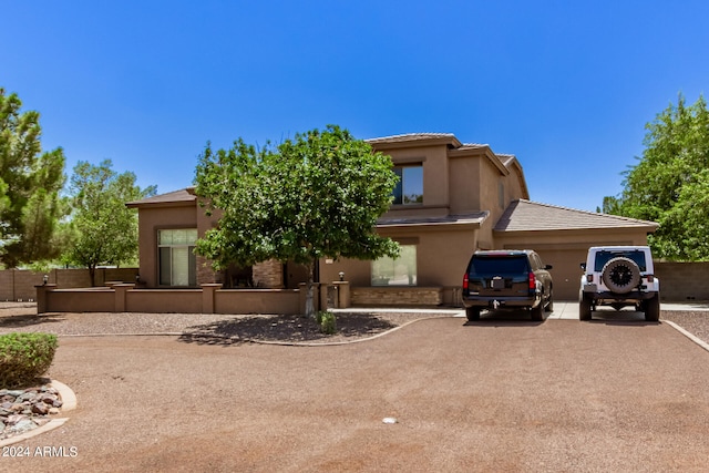 view of front of property featuring a garage