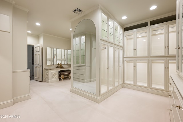 mudroom featuring ornamental molding