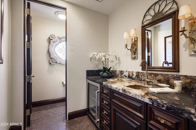 bathroom with vanity and beverage cooler