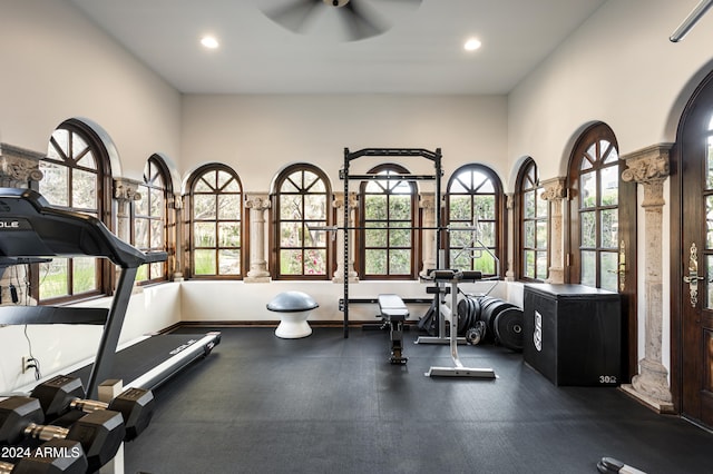 workout area with ceiling fan and a wealth of natural light