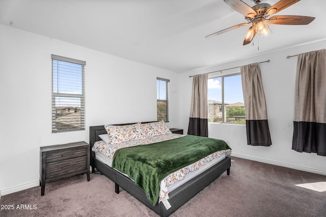 bedroom with carpet, baseboards, and ceiling fan