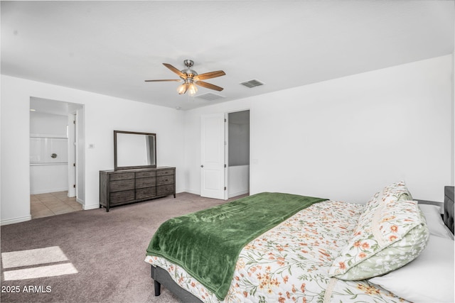 carpeted bedroom featuring baseboards, ceiling fan, and visible vents