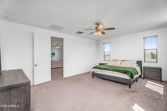 bedroom featuring baseboards, visible vents, and carpet