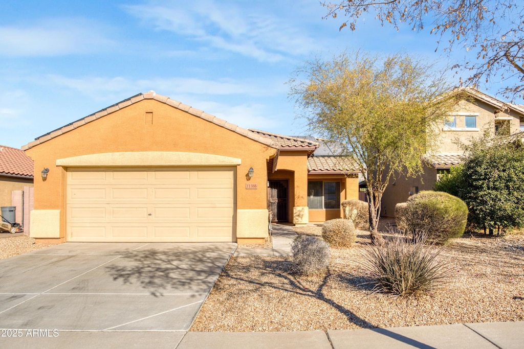 view of front of home with a garage