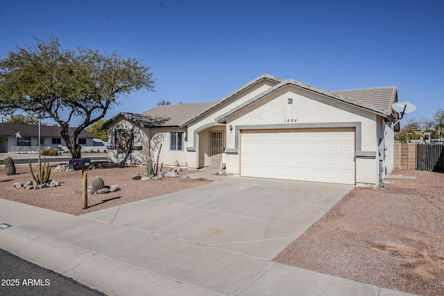 ranch-style house featuring a garage