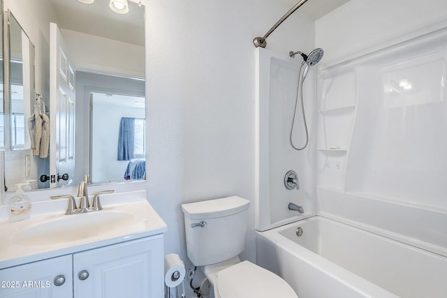 full bathroom with shower / bathing tub combination, vanity, and toilet