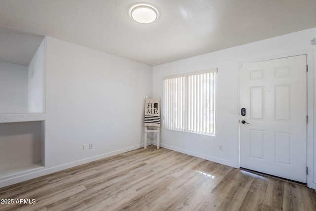 foyer featuring light wood-type flooring