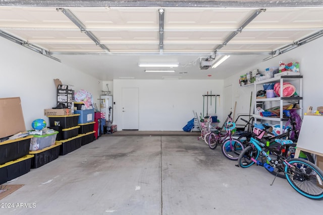 garage featuring secured water heater and a garage door opener