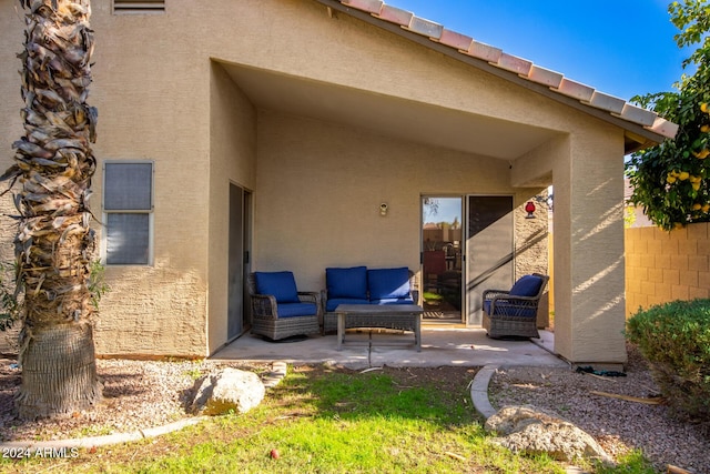 rear view of property with a patio