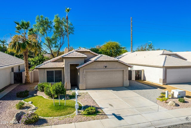 ranch-style house with a garage