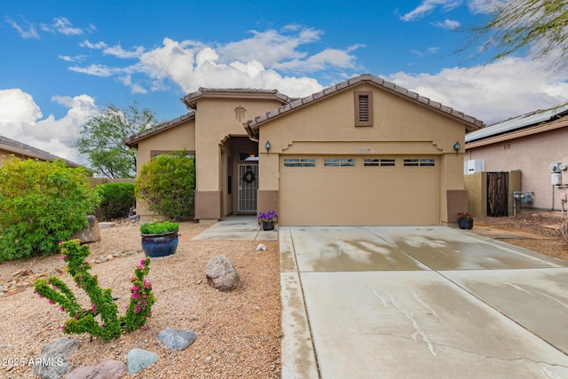 42328 N 46th Ln, Phoenix, AZ 85086 - view of front of home with driveway, stucco siding, and a garage