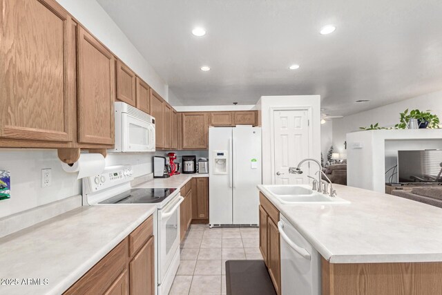 42328 N 46th Ln, Phoenix, AZ 85086 - kitchen featuring light countertops, a sink, light tile patterned floors, and white appliances