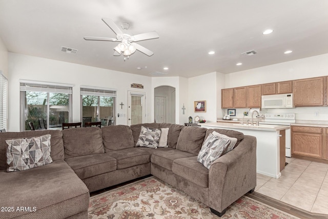 42328 N 46th Ln, Phoenix, AZ 85086 - living room with recessed lighting, arched walkways, ceiling fan, and visible vents