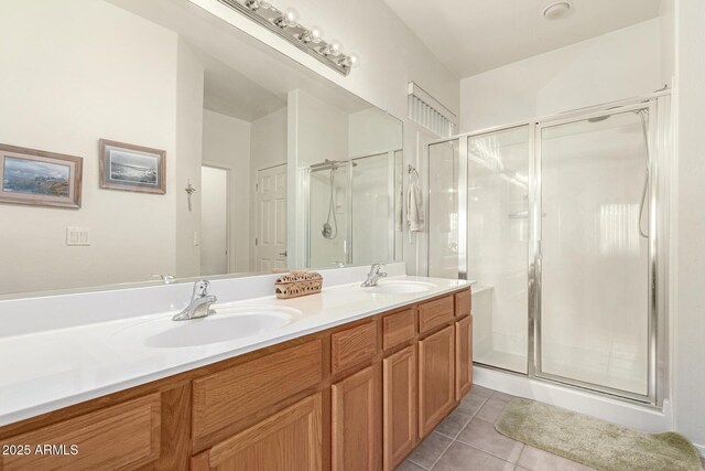 42328 N 46th Ln, Phoenix, AZ 85086 - bathroom with a stall shower, tile patterned flooring, and a sink