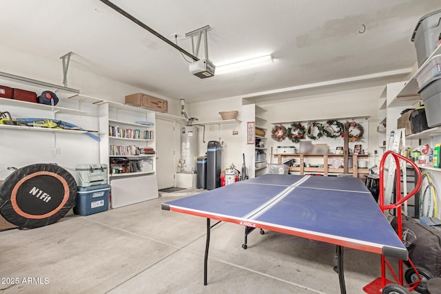 42328 N 46th Ln, Phoenix, AZ 85086 - recreation room with water heater, concrete floors, and a garage