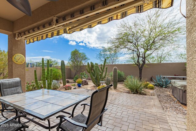 42328 N 46th Ln, Phoenix, AZ 85086 - view of patio with a fenced backyard and outdoor dining area