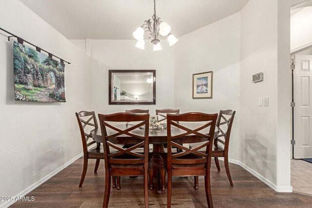 42328 N 46th Ln, Phoenix, AZ 85086 - dining space with baseboards, wood finished floors, and a chandelier