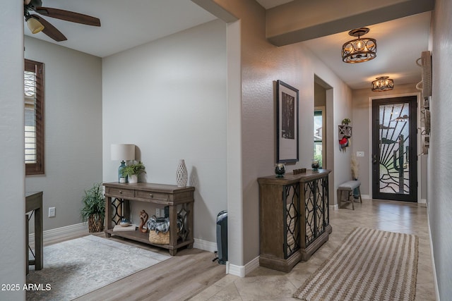 22574 W Moonlight Path, Buckeye, AZ 85326 - foyer entrance with a chandelier and ceiling fan