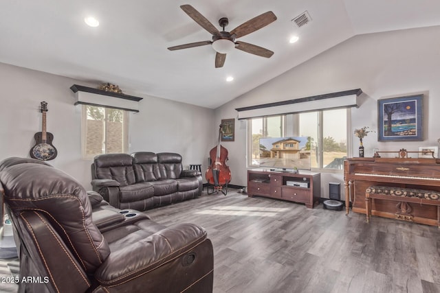 living area featuring recessed lighting, wood finished floors, a ceiling fan, visible vents, and vaulted ceiling