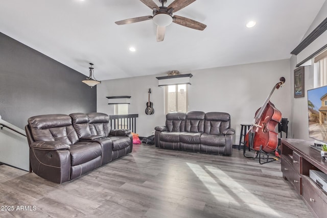 living area featuring recessed lighting, ceiling fan, and wood finished floors