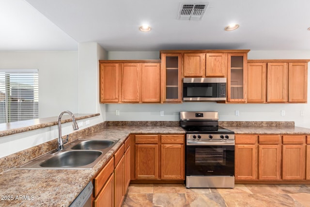 kitchen with stainless steel appliances and sink