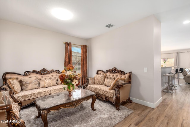 living area with light hardwood / wood-style floors