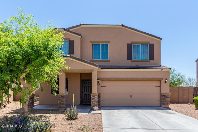 view of front of home featuring a garage