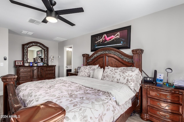 bedroom featuring ceiling fan and ensuite bathroom