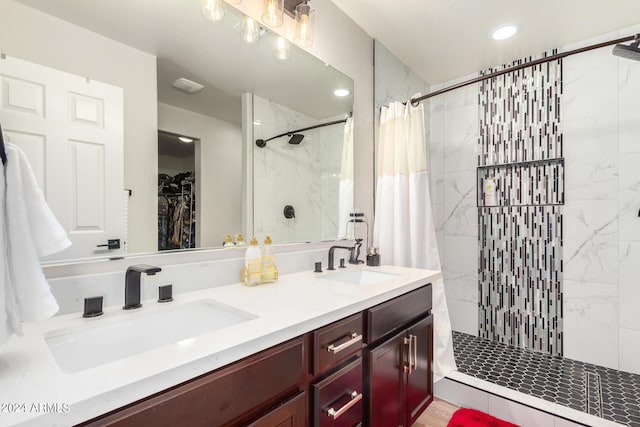 bathroom featuring vanity and walk in shower