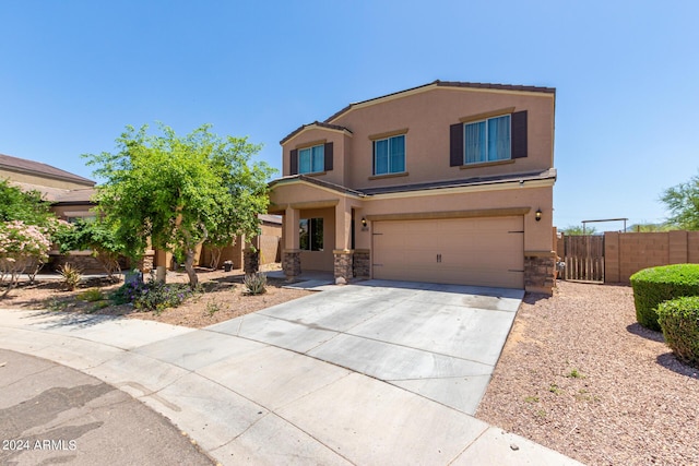 view of front of property featuring a garage