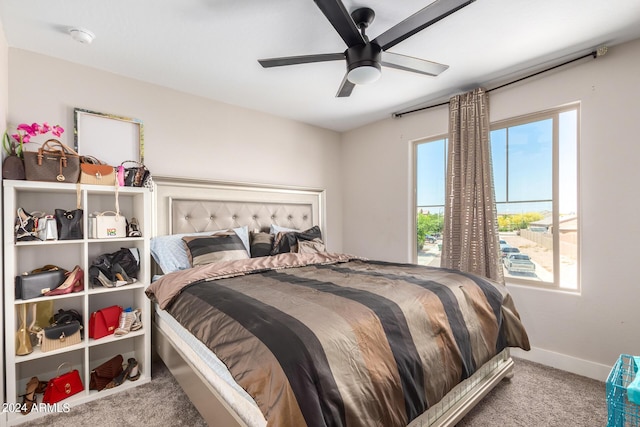 bedroom featuring ceiling fan and carpet floors