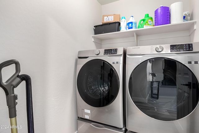 clothes washing area featuring independent washer and dryer