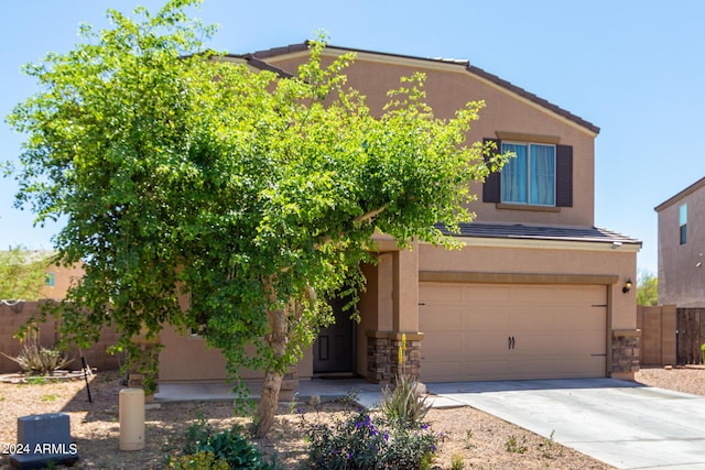 view of front of home with a garage