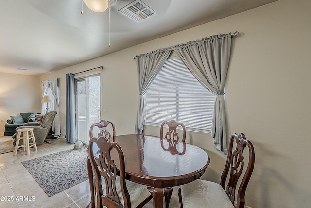2125 W Central Ave, Coolidge, AZ 85128 - dining room with light tile patterned floors and a ceiling fan