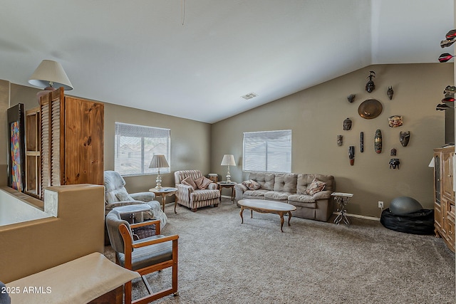 2125 W Central Ave, Coolidge, AZ 85128 - carpeted living area with vaulted ceiling and baseboards