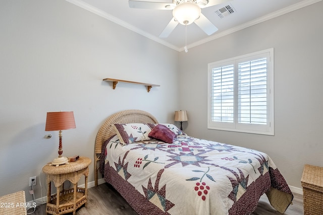 bedroom featuring crown molding, ceiling fan, and hardwood / wood-style flooring